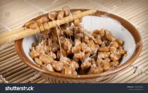 stock photo sticky and stringy natto healthy traditional japanese food made of fermented soybeans 1896978046 300x189 1